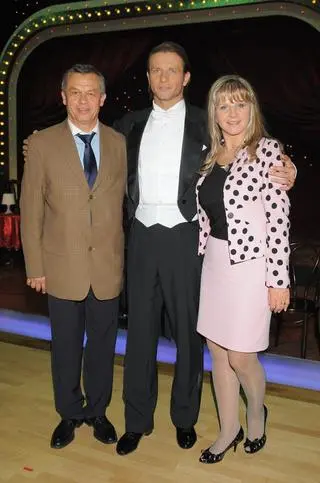 Radosław Majdan z rodzicami