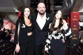 Tomasz Oświeciński z żoną i córką